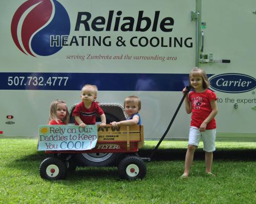 kids in front of truck